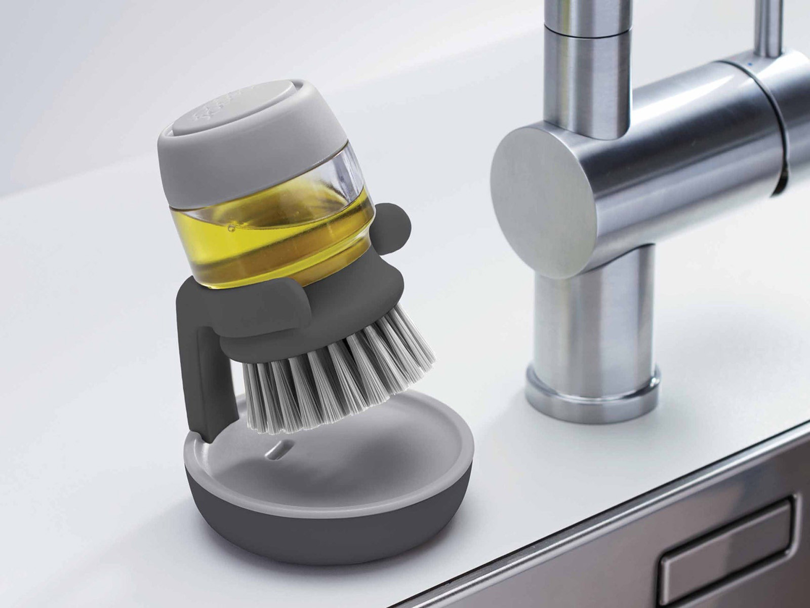 Szczotka do naczyń z pojemnikiem Joseph Joseph Palm Scrub Grey